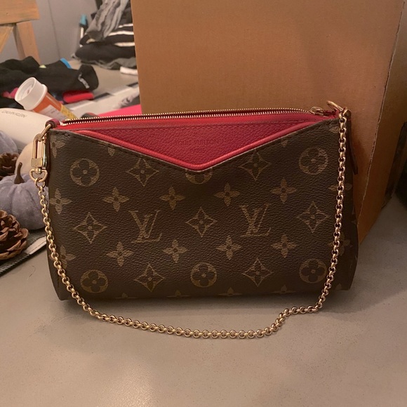 louis vuitton pallas clutch discontinued